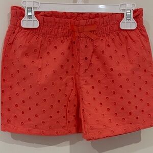 Orange Eyelet Shorts with Bow, elastic waist. New without tags.